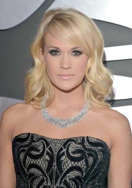 carrie-underwood-grammy-smoky-eyeWhich of these looks was your favorite?
Bing: Grammys 2013 red carpet
Photos: Getty Images and WireImage